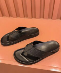 Louis Vuitton Embossed Monogram Thong Slide In Black