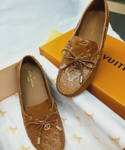 Louis Vuitton Gloria Flat Loafer Monogram Embossed Cowhide In Brown